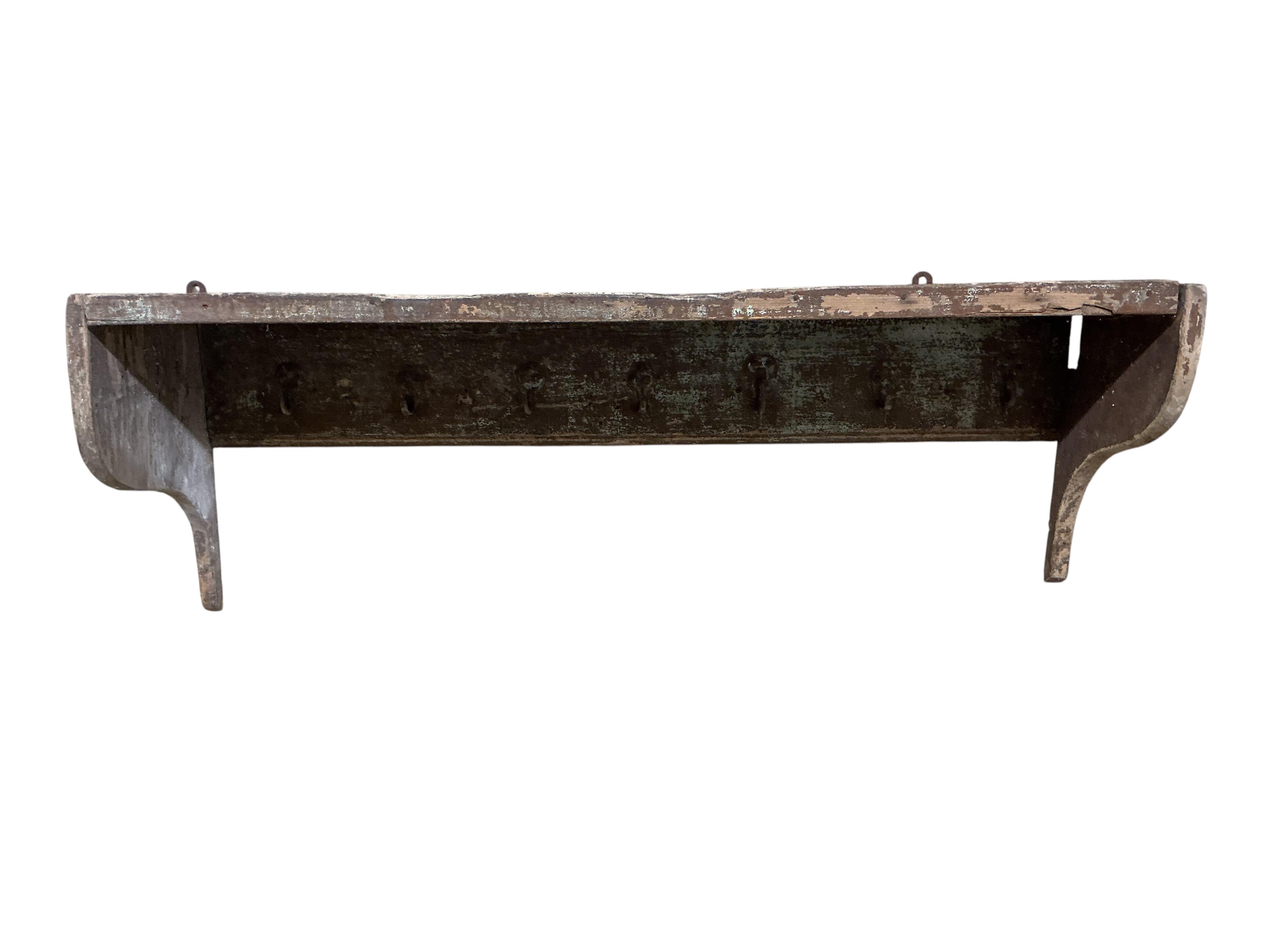 A 19th century painted pine wall bracket, width 105cm, depth 30cm, height 37cm